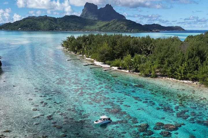 Mount Otemanu over a shallow sandbank and motu