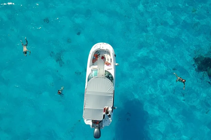 Reef Discovery boat from above over turquoise water